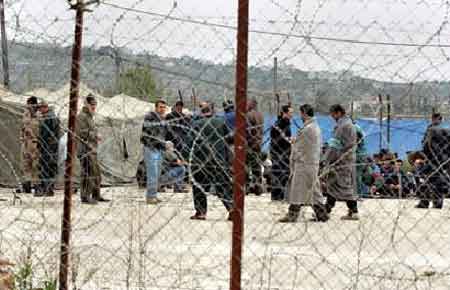 Red Cross slammed for calling on Hamas to let Shalit be in touch with his family